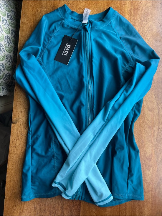 Daci Other - Daci Women's M Teal Zip-Front Rash Guard Swim NWT see photos for condition